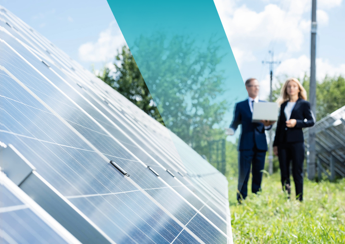 Professionals inspecting solar panels in a photovoltaic power plant with digital tools