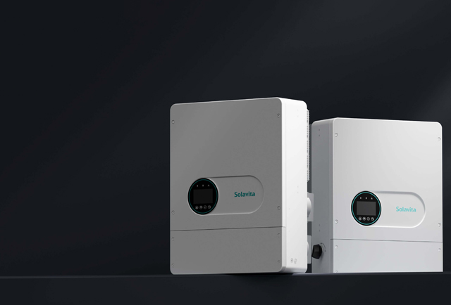 Two Solavita hybrid inverters with digital display on a dark background, showcasing modern energy technology